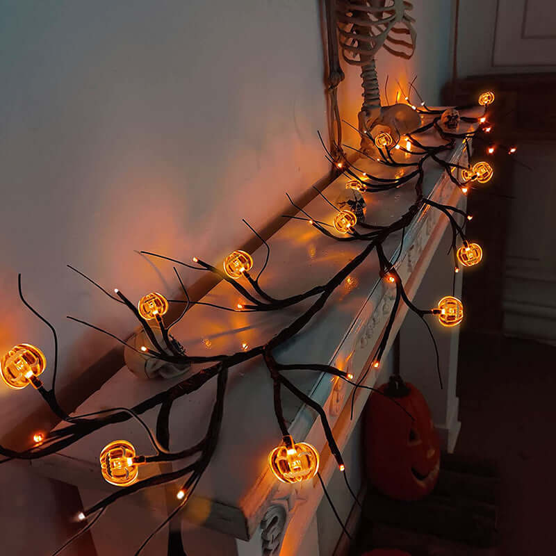 Warm-glowing Halloween rattan lights with bat and pumpkin shapes