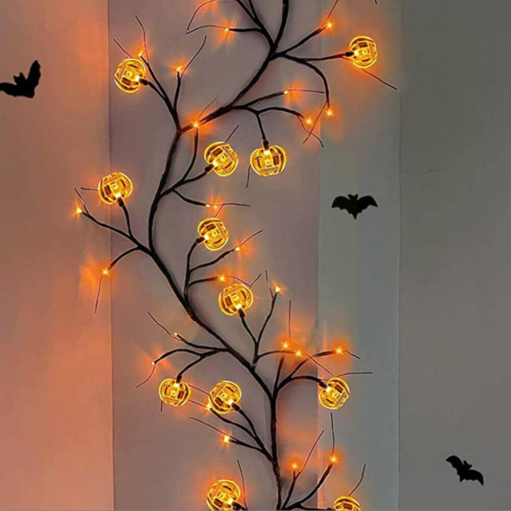 Warm-glowing Halloween rattan lights with bat and pumpkin shapes