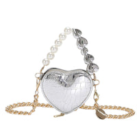 Mini Love-Shape Pearls Handbag - Heart-shaped silver handbag with pearl and heart chain detailing, perfect for adding playful style