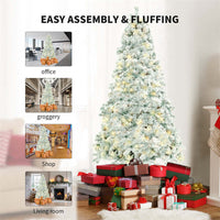 Snow-covered PVC Christmas tree with metal stand and gifts, suitable for office, grocery, shop, and living room decoration.