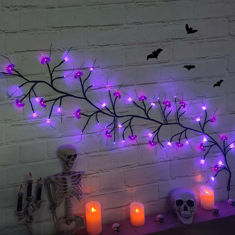 Warm-glowing Halloween rattan lights with bat and pumpkin shapes