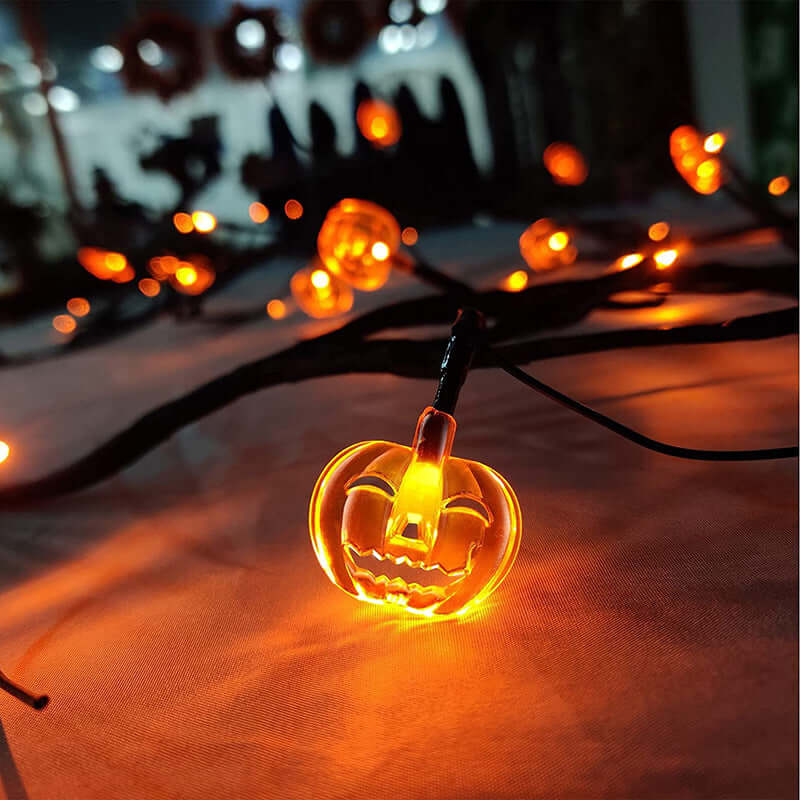 Warm-glowing Halloween rattan lights with bat and pumpkin shapes